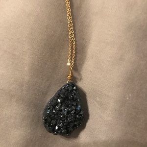 Black jeweled rock necklace.